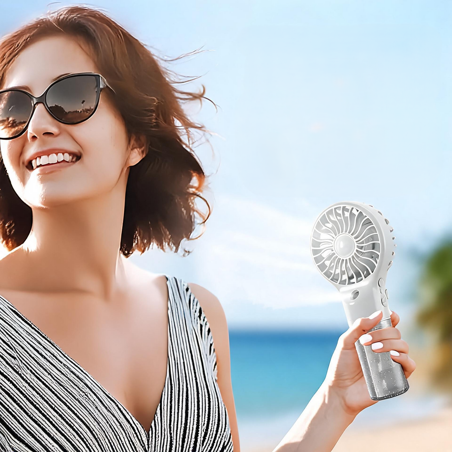 Portable Rechargeable Handheld Fan with Mist Spray.