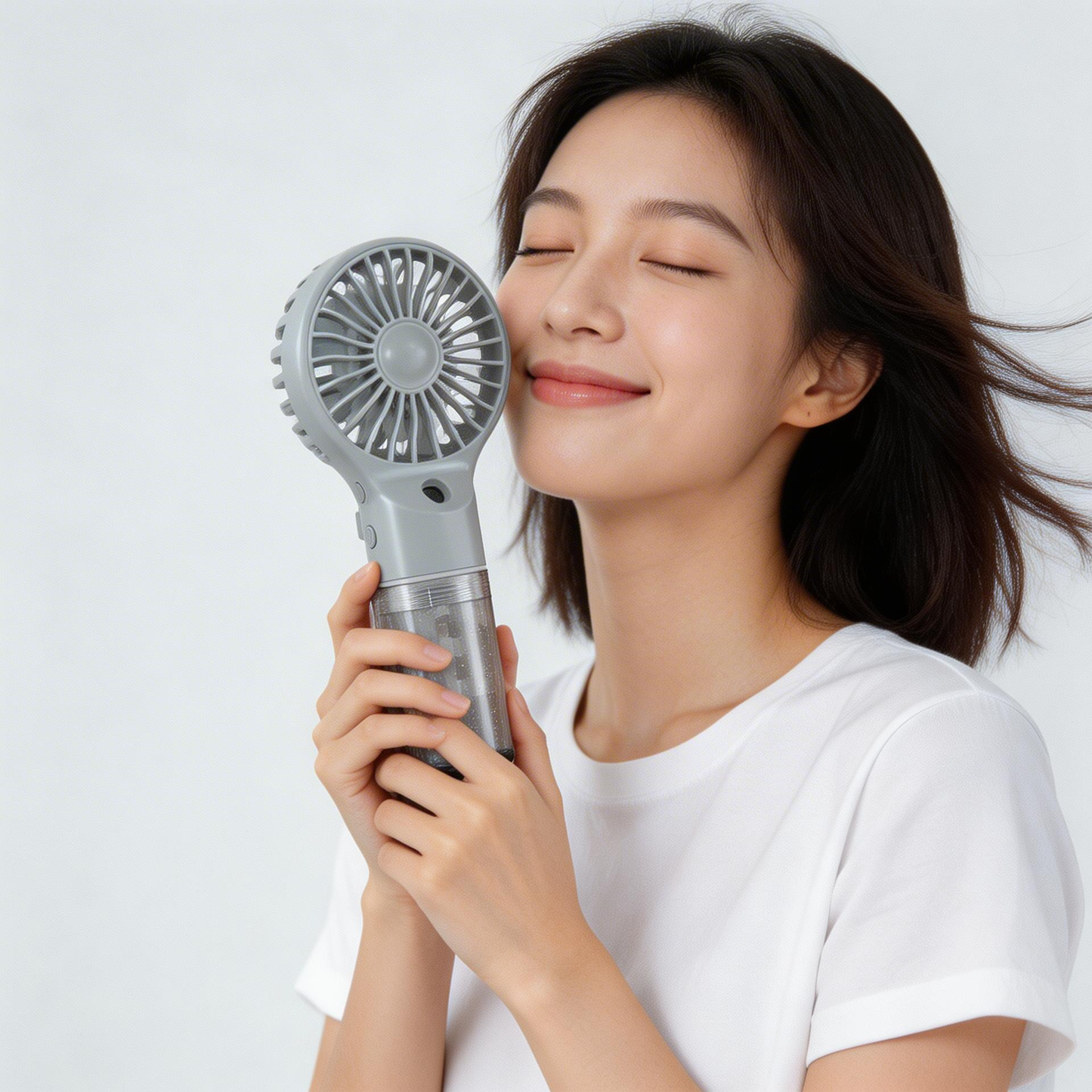 Portable Rechargeable Handheld Fan with Mist Spray.